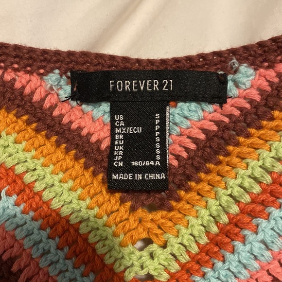 Colourful knitted vest with undoable buttons - Picture 2 of 2